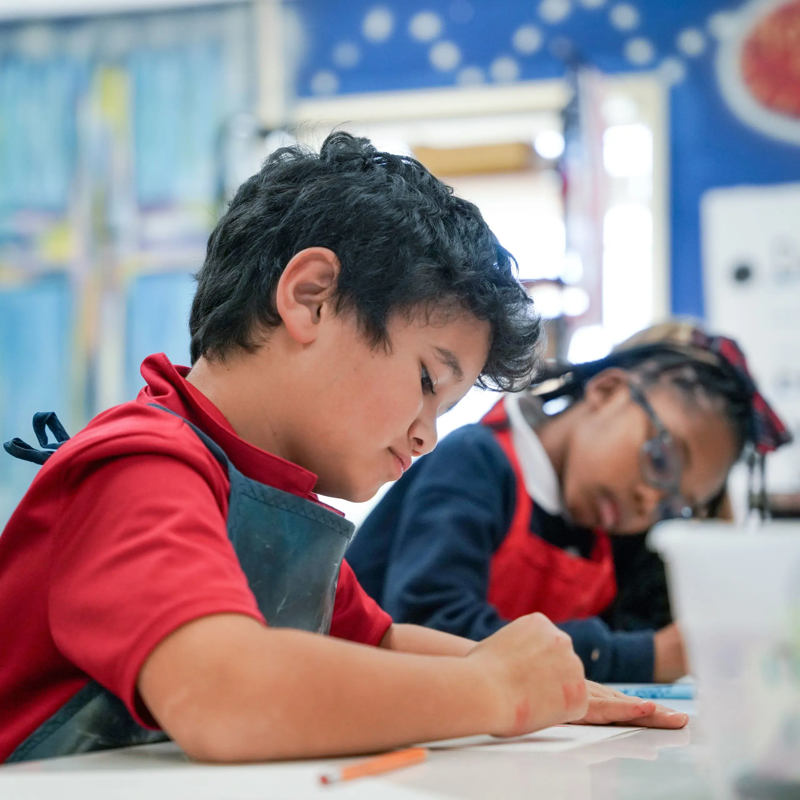 Two students drawing