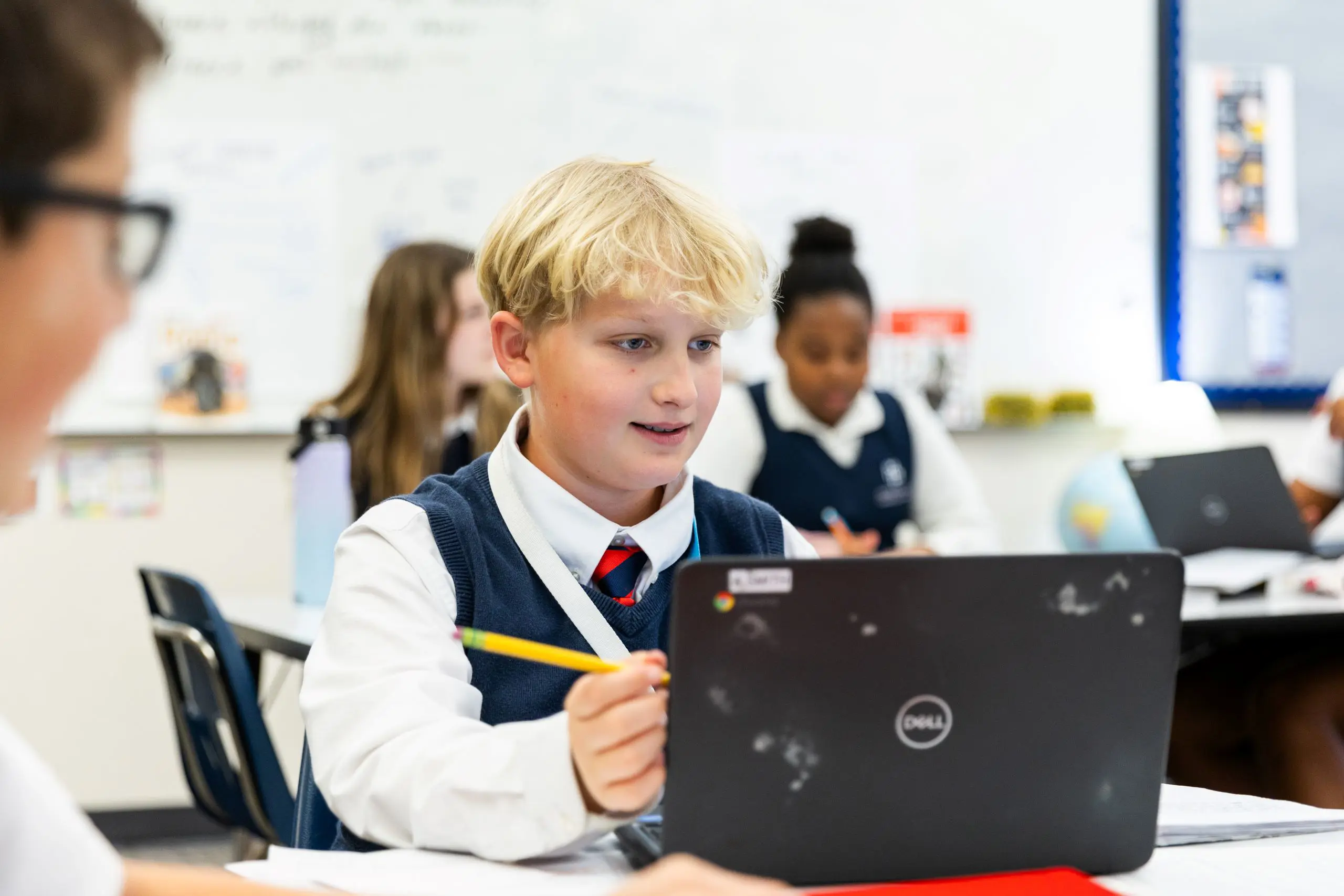 Student sitting in front of laptop