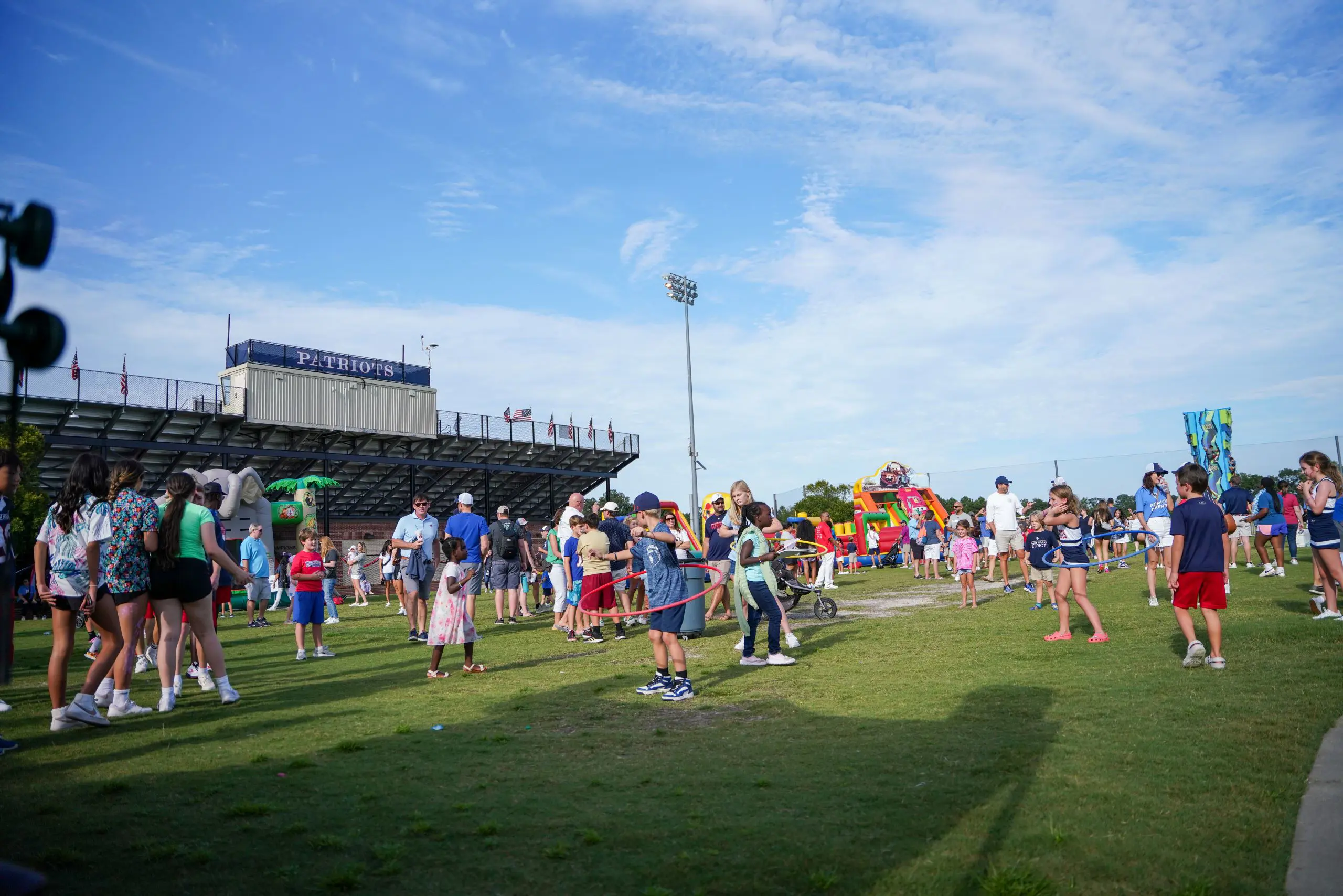 People standing on athletics field