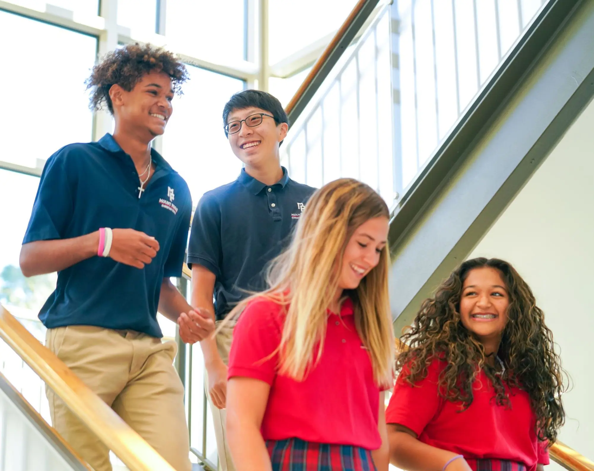 Students walking down stairs